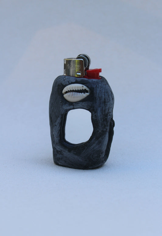 Cowry shell staring back at you mini